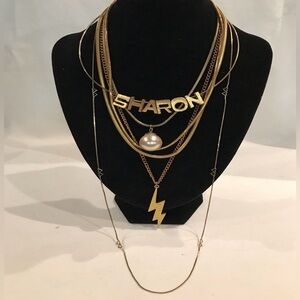 Gold Tone set of 6 pcs Nameplate Necklace with Pearl Lightning Pendant